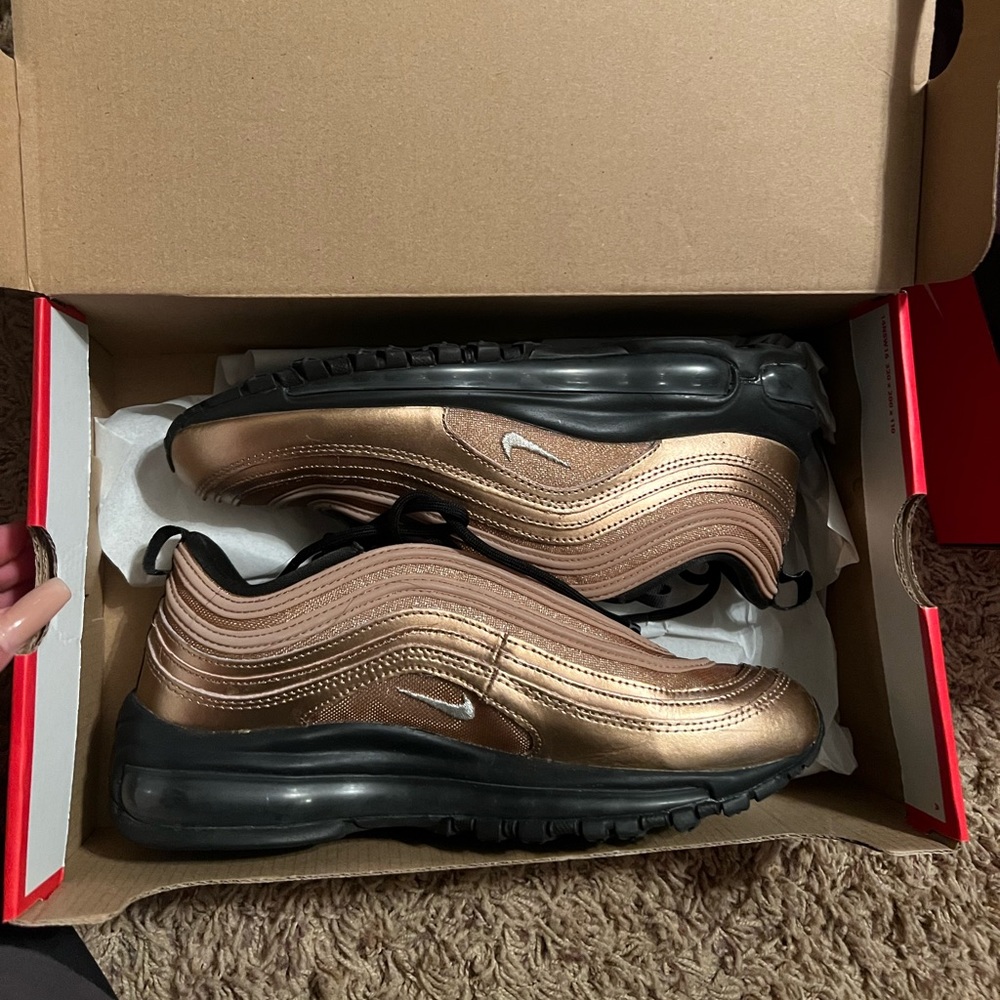 Gold sparkle Nike tennis shoes